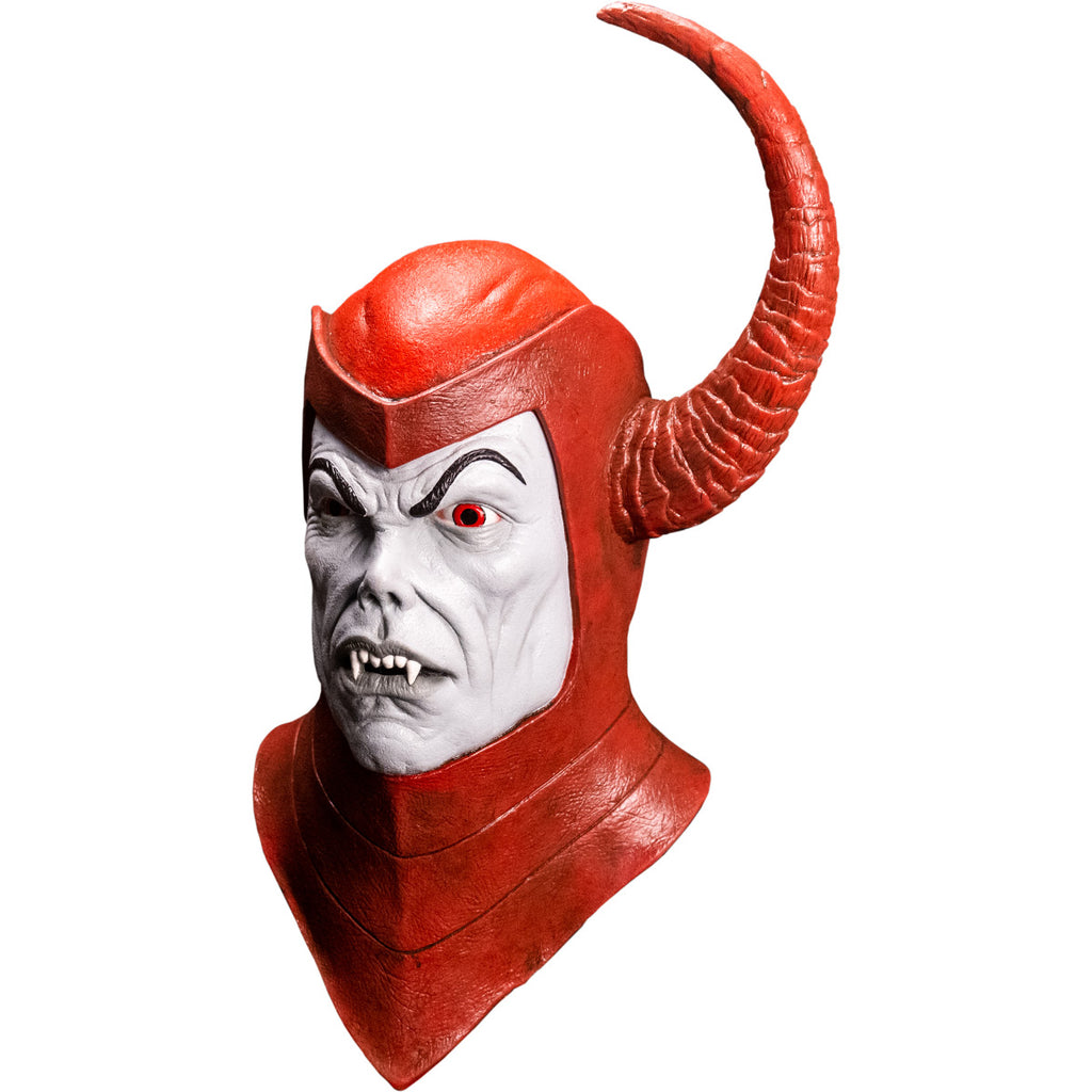 Mask, left side view, head and neck. Red Helmet and cowl, large red horn protruding from left side of head. Light gray face with black eyebrows, red eyes, small nose, mouth with fangs, gray lips.