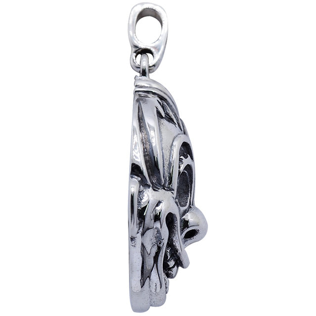 Right side view. Sterling silver clown face pendant.