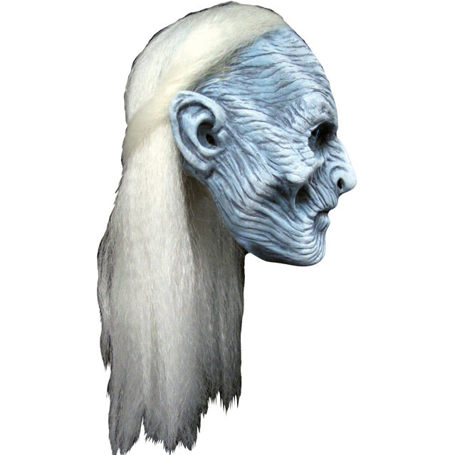 Right side view. White Walker Mask. Long white hair, half pulled back, extremely wrinkled light gray skin. Deep set bright blue eyes.