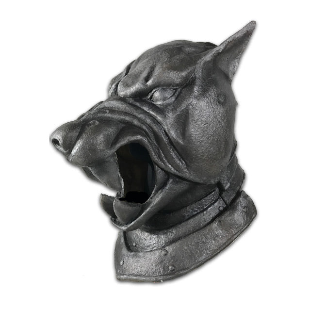 Left side view. Helmet, made to appear like black metal. Snarling hound face, neck piece with rivets.