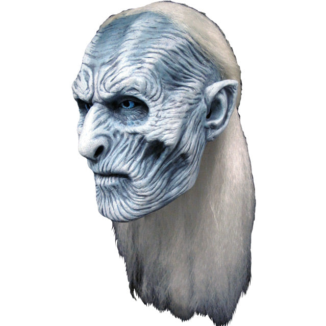 left side view. White Walker Mask. Long white hair, half pulled back, extremely wrinkled light gray skin. Deep set bright blue eyes.