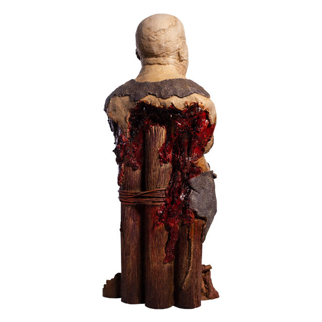 Bust back view. Zombie, head and torso torn shirt. Back is gory and bloody. Base is wooden pier posts and rope.
