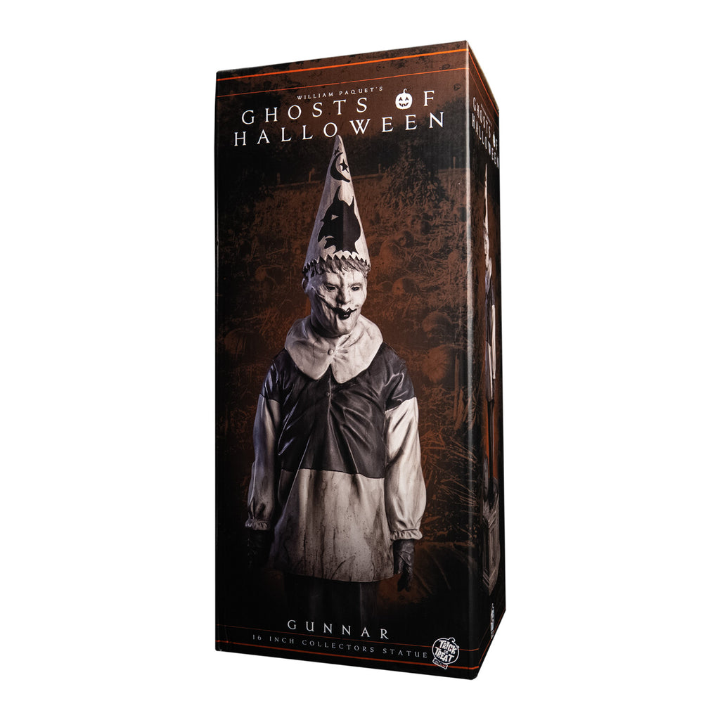 Product packaging, Front of box, text reads Ghosts of Halloween, Gunnar. Front view, statue. Grayscale, Creepy clown, tall pointy hat, black and white shirt with large white collar, black pants, and gloves. 