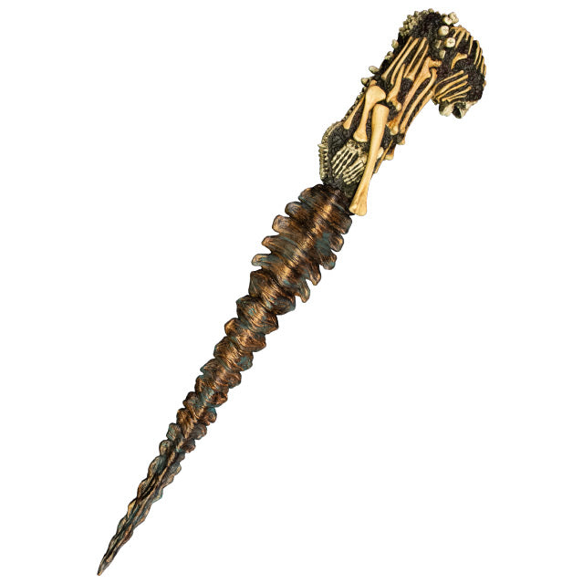 Kandarian dagger prop. Handle has skull at top, knife includes teeth, spinal cord, and rib bones