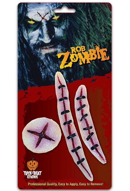 Rob Zombie - Scars Appliances in packaging,  Rob Zombie's face, yellow text reads Rob Zombie.  3 prosthetic scar appliances, X wound, 2 stiched straight wounds. Trick or Treat Studios logo. Yellow text at bottom reads Professional quality, easy to apply, easy to remove.