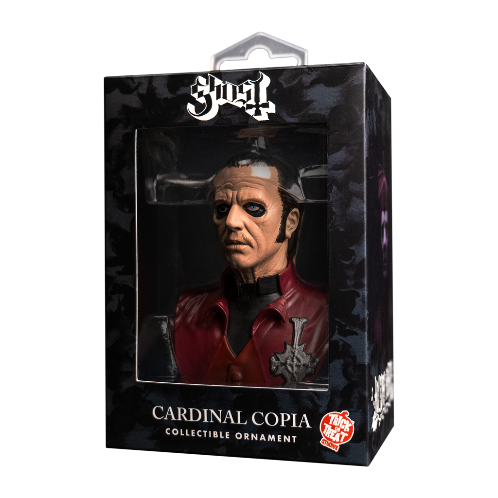 Product packaging, front, black window box with Ghost, Cardinal Copia ornament inside.  Text on box reads Ghost, Cardinal Copia, collectible ornament. Orange and white Trick or Treat Studios logo