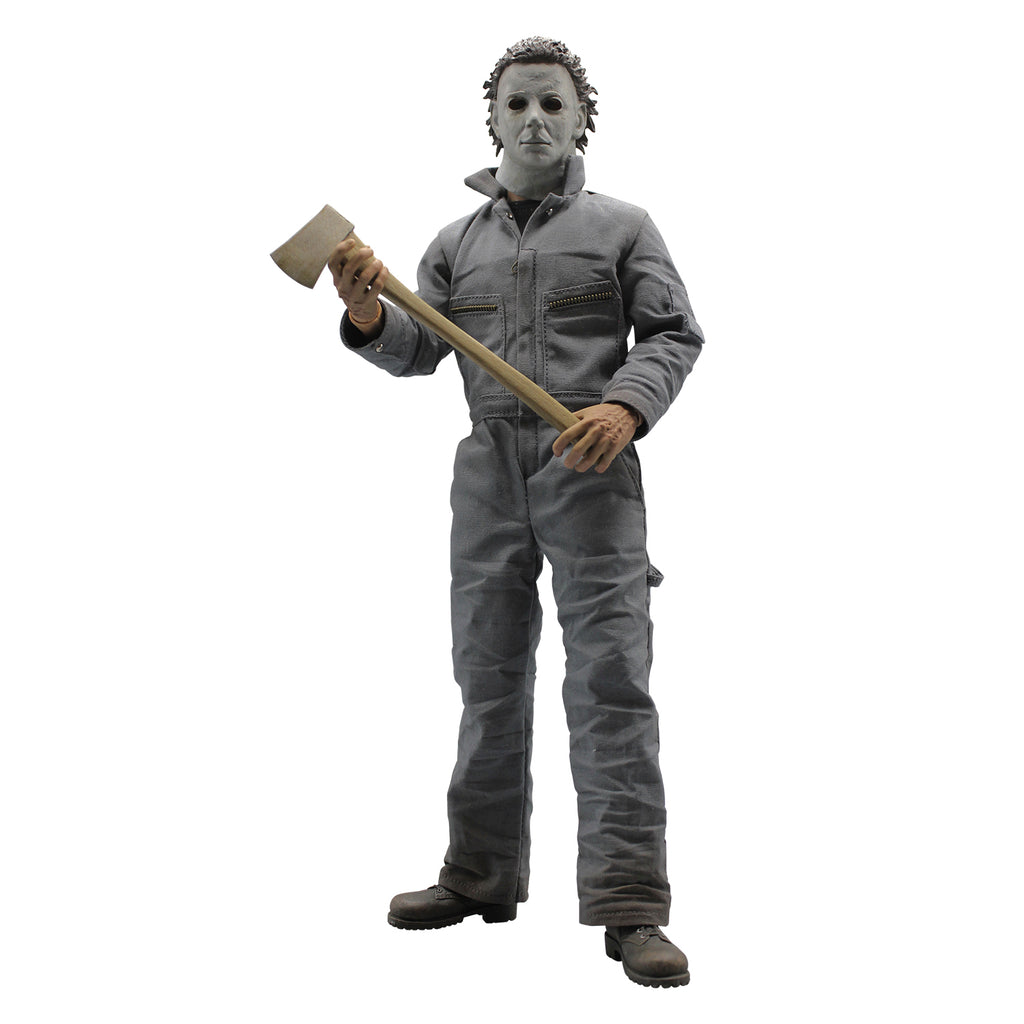 Front view. Halloween 6 Michael Myers 12" figure. White mask brown hair, wearing coveralls, black boots, holding axe in both hands.