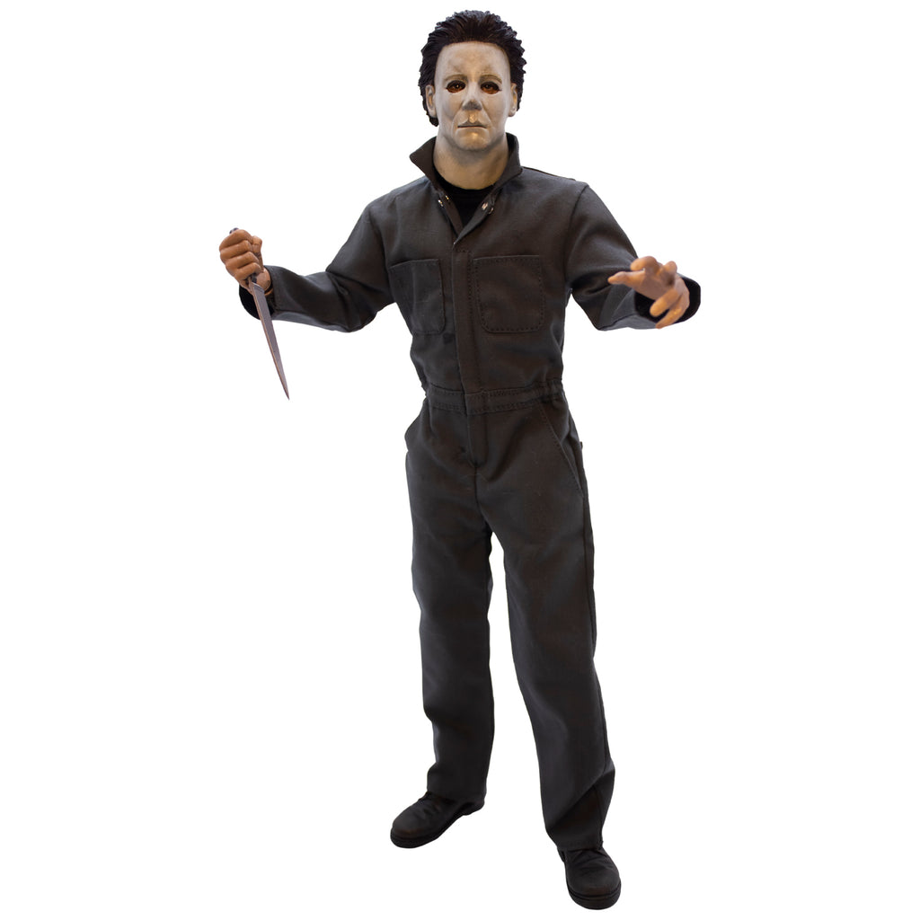 Halloween H20 Michael Myers 12" figure. White mask brown hair, wearing dark coveralls, black boots, holding butcher knife in right hand.
