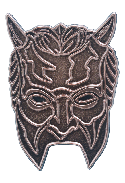 Enamel pin, metallic. male face, 2 horns on forehead. Blank spot where mouth would be.