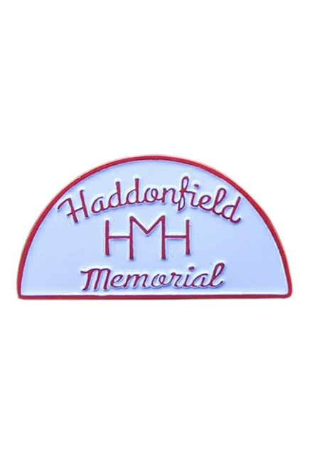 Enamel pin. Blue and red. Cursive Text reads Haddonfield HMH Memorial