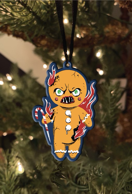 Metal ornament.  Angry Gingerbread man with flames coming off his body, holding a sharpened candy cane.