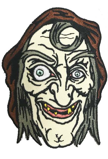 Sea Hag patch.  Wrinkled hag face, gray hair and eyebrows, brown hood.  Green eyes, right eye enlarged. Grin with sparse yellow teeth.