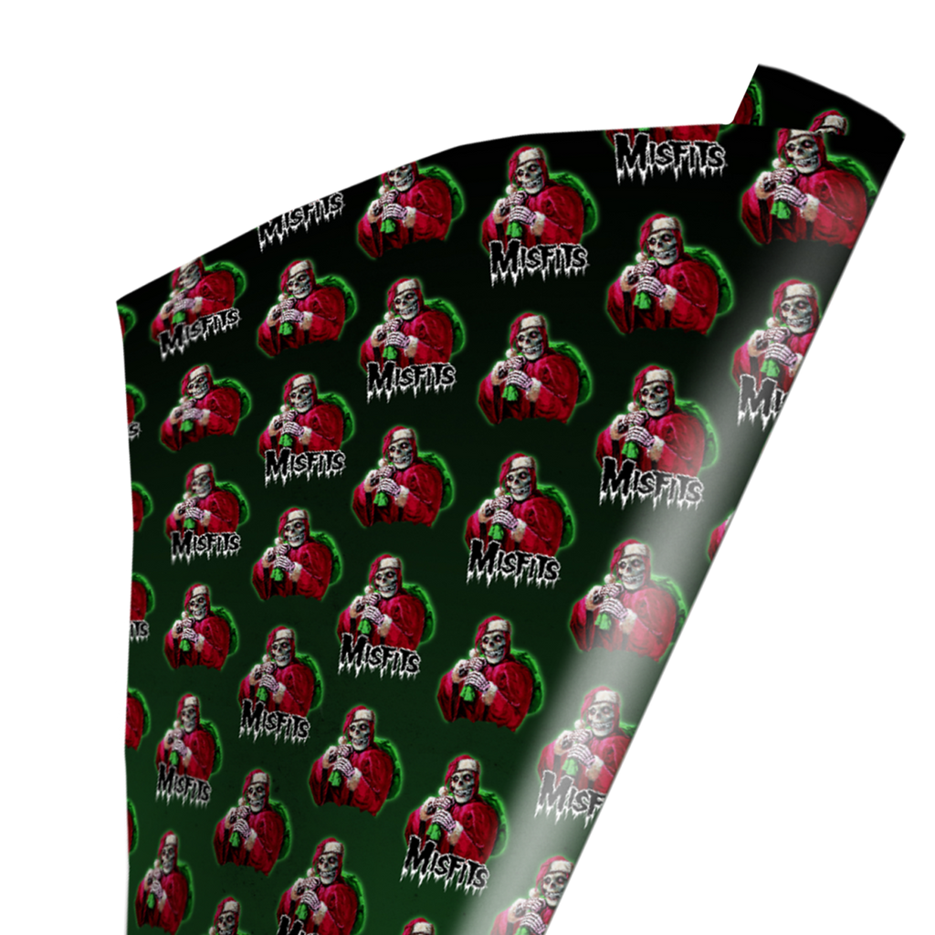 Wrapping paper.  Dark green background with repeating pattern of Misfits Fiend in a red Santa suit