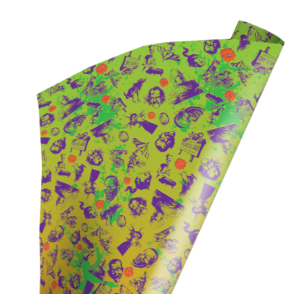 Wrapping paper with Goosebumps images printed in green, purple and orange ink on a yellow and green background.