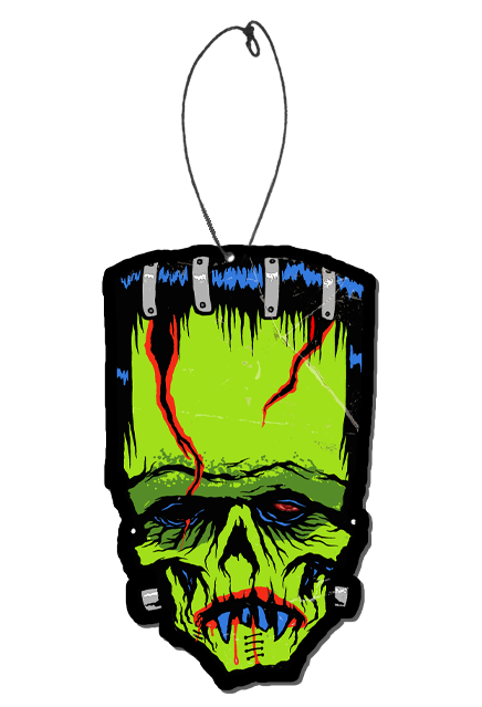 Air freshener. Illustration of Frankenstein-like monster face. Black hair with blue highlights, elongated forehead, flat head. Green skin, Large wounds on both sides of forehead, wound on right side runs down through right eye. Blue rimmed red left eye. No nose, down-turned red mouth, blood dripping, sharp blue teeth. Silver metal posts on sides of neck.