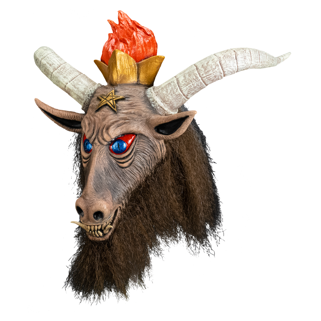 Slayer, Baphomet mask, left side view. Brown goat face, Large white horns, blue and red eyes, prominent dirty teeth, with two large bottom tusks. Brown shaggy fur around neck. Gold pentacle on forehead. Wearing gold crown with orange flames coming out of it.