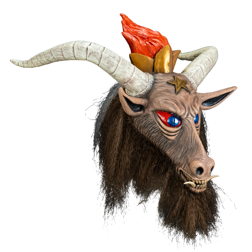 Slayer, Baphomet mask, right side view. Brown goat face, Large white horns, blue and red eyes, prominent dirty teeth, with two large bottom tusks. Brown shaggy fur around neck. Gold pentacle on forehead. Wearing gold crown with orange flames coming out of it.