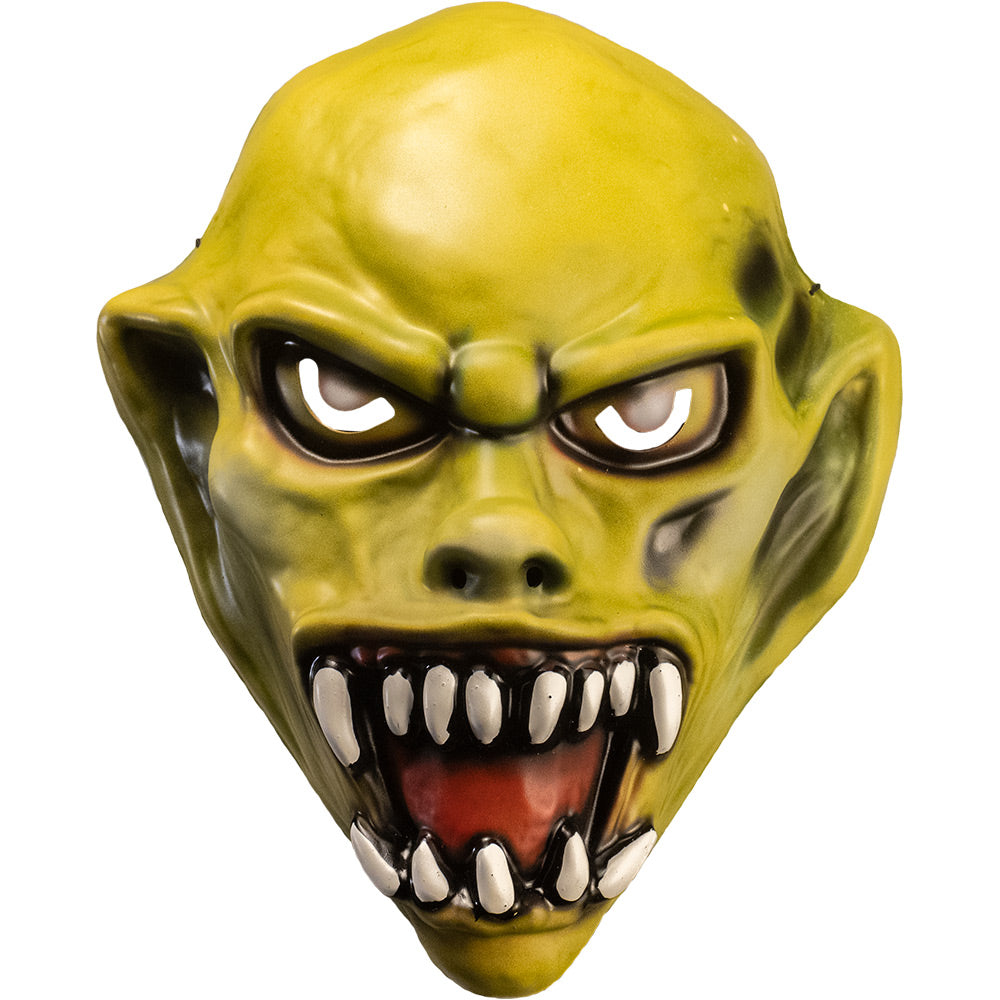 Vacuform plastic mask, front view. Yellow skin. Angry face with large ears, yellow eyes, large snarling mouth with sharp white teeth.