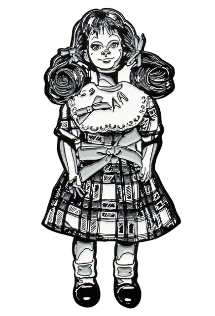 enamel pin. Black and white illustration, Talky Tina doll wearing plaid dress, with bow at waist, hair in two ponytails with bows. Black shiny dress shoes, white socks.