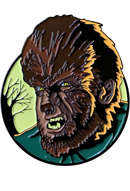 Enamel pin. Brown furry werewolf face, yellow eyes, wearing blue collared shirt. Pale yellow background with bare tree.